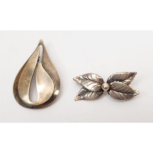 57 - A sterling silver brooch signed SVAN together with a Danish sterling silver brooch. UK shipping £14.