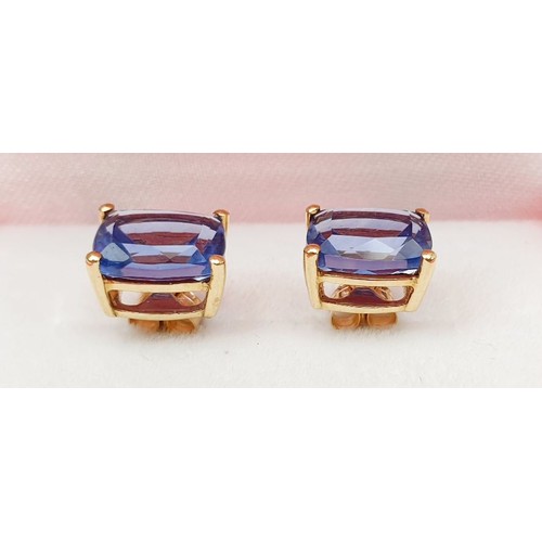 39 - A pair of 10ct gold earrings set with colour change fluorite. UK shipping £14.