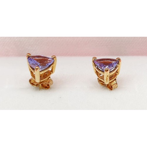 41 - A pair of 9ct gold earrings set with AA tanzanite. UK shipping £14.