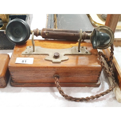 81 - An early 20th century Bakelite and oak wall mounted telephone handset. UK shipping £14.