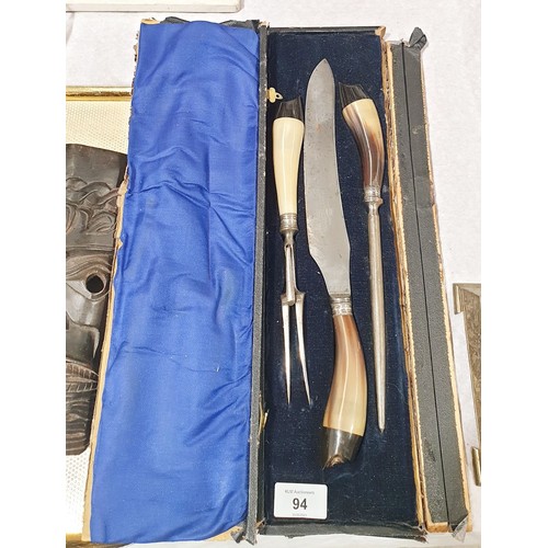 94 - An antique carving set having hallmarked silver collars and horn handles, maker Thomas Wilson, Sheff... 