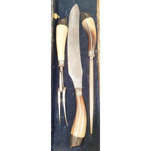 94 - An antique carving set having hallmarked silver collars and horn handles, maker Thomas Wilson, Sheff... 