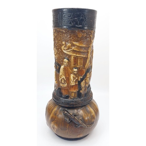 299 - An antique Bretby vase decorated in relief with lizards and Japanese scenes, height 13.25