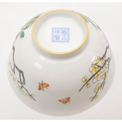 302 - A Chinese porcelain bowl finely hand painted with relief prunus and flowers, diameter 5.75