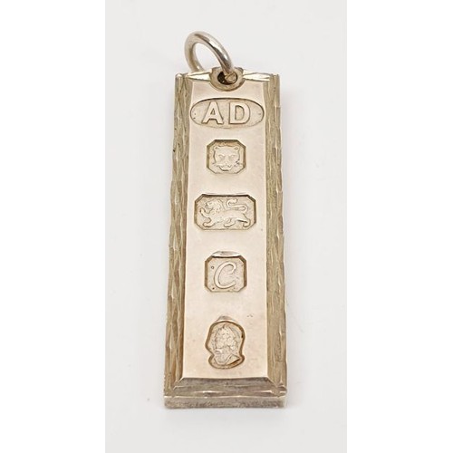 2 - A hallmarked silver ingot pendant, London 1977, weight 15g. UK shipping £14.