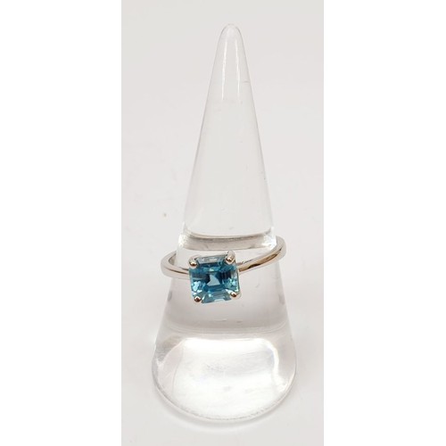 18 - A hallmarked 9ct white gold ring set with blue zircon, size P/Q, gross weight 2.7g. UK shipping £14.