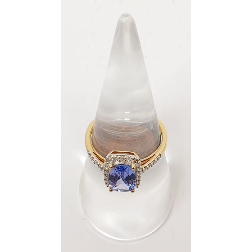 28 - A hallmarked 18ct gold tanzanite and diamond cluster ring, size N/O, gross weight 2.5g. UK shipping ... 