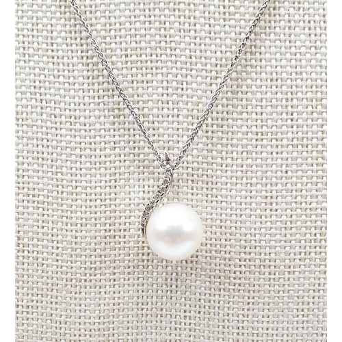 50 - A 14ct white gold pearl and diamond pendant on an 18ct white gold chain, gross weight 4.4g. UK shipp... 