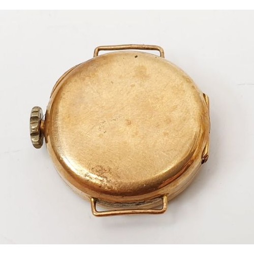 58 - A ladies 9ct gold cased wrist watch, A/F. UK shipping £14.