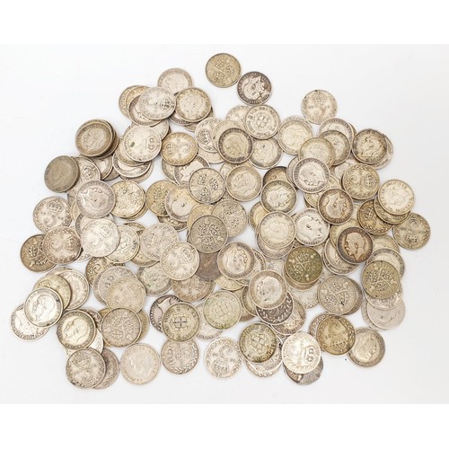 63 - A quantity of pre-1947 silver three pence coins, weight 228g. UK shipping £14.