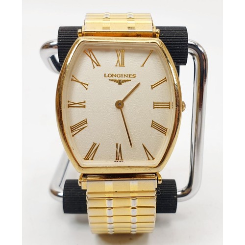 68 - A gentleman's gold plated quartz Longines wrist watch on a replacement expanding bracelet. UK shippi... 