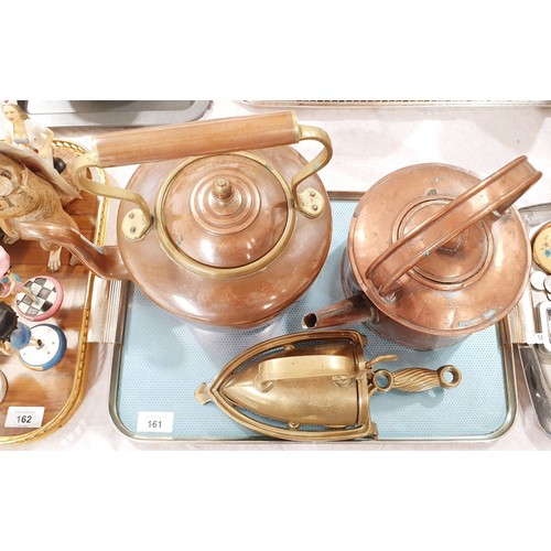 161 - Two antique copper kettles and a brass iron and a trivet. No shipping. Arrange collection or your ow... 