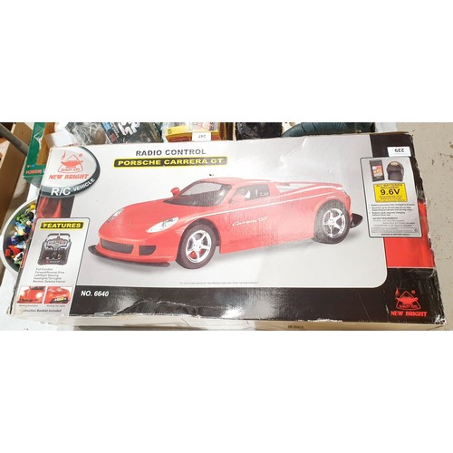 229 - A boxed radio control Porsche Carrera GT. No shipping. Arrange collection or your own packer and shi... 