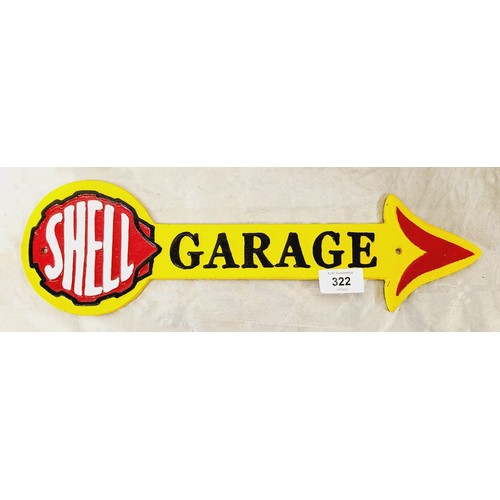 322 - A cast iron Shell Garage wall plaque, length 15.75