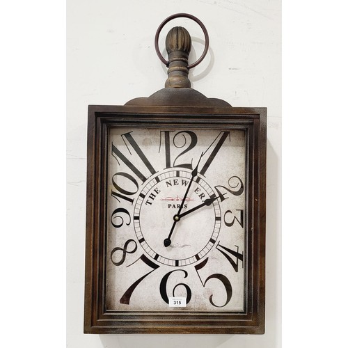 315 - A vintage style wall clock in working order, length 27