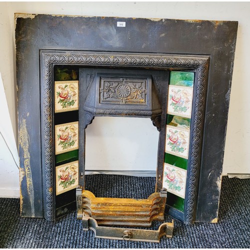 313 - An early 20th century cast iron and tile fire surround, height 40.25