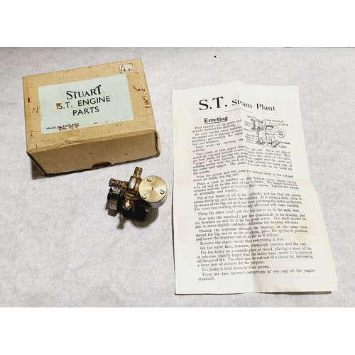 217 - A box of model making items and tools including a boxed Stuart Turner S.T. steam plant. UK shipping ... 