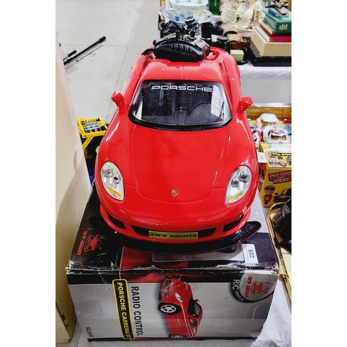 229 - A boxed radio control Porsche Carrera GT. No shipping. Arrange collection or your own packer and shi... 