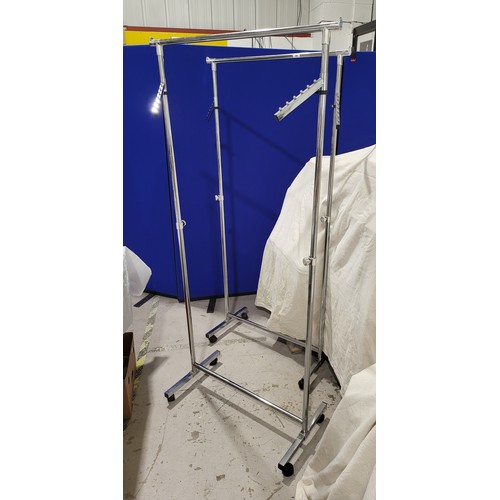 349 - Two clothes rails, height 68