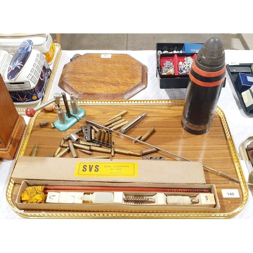 140 - A vintage capper and decapper tool, a shell, inert bullets and a gun cleaning kit. No shipping. Arra... 