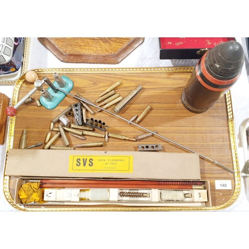 140 - A vintage capper and decapper tool, a shell, inert bullets and a gun cleaning kit. No shipping. Arra... 