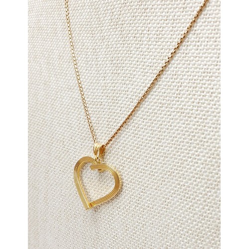 13 - A 9ct gold heart shaped pendant on a 9ct gold chain, weight 3g. UK shipping £14.