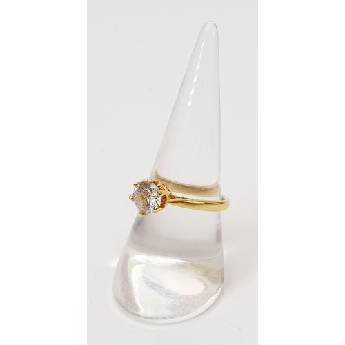 38 - An 18ct gold ring set with a white stone, size O, gross weight 3.7g. UK shipping £14.