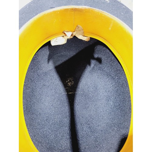 114 - A vintage bowler hat. UK shipping £14.