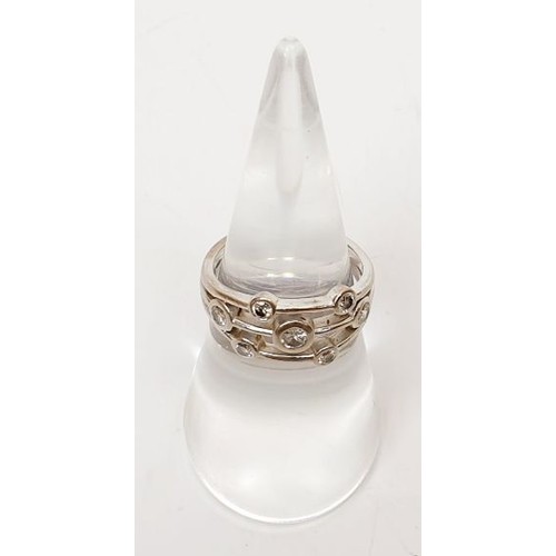 11 - A hallmarked 18ct white gold diamond set bubble ring, size M, gross weight 5.5g. UK shipping £14.