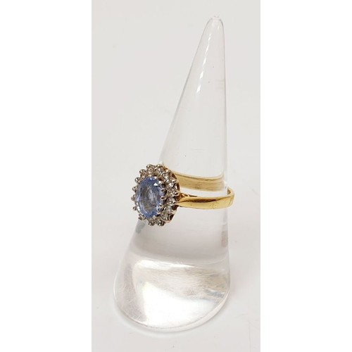 12 - A hallmarked 18ct gold Ceylon sapphire and diamond cluster ring A/F, size M/N, gross weight 4.2g. UK... 