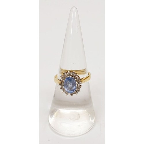 12 - A hallmarked 18ct gold Ceylon sapphire and diamond cluster ring A/F, size M/N, gross weight 4.2g. UK... 