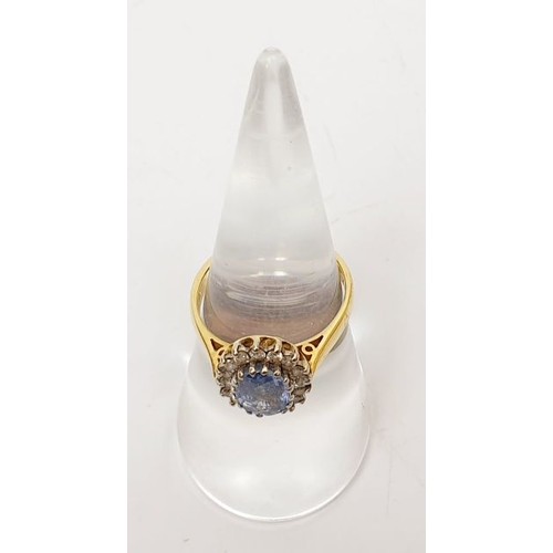 12 - A hallmarked 18ct gold Ceylon sapphire and diamond cluster ring A/F, size M/N, gross weight 4.2g. UK... 