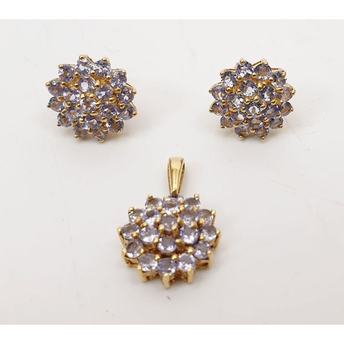 16 - A pair of 9ct gold tanzanite cluster earrings together with matching pendant, gross weight 3g. UK sh... 