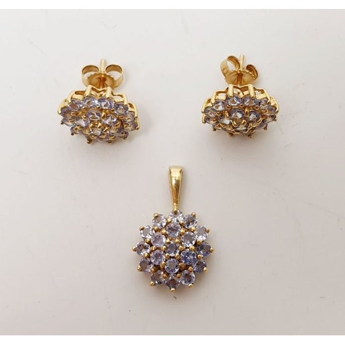 16 - A pair of 9ct gold tanzanite cluster earrings together with matching pendant, gross weight 3g. UK sh... 