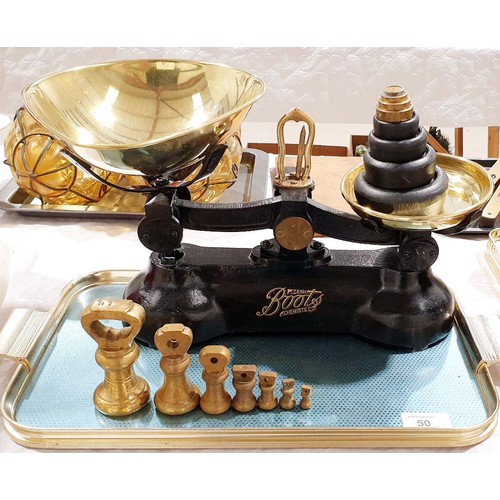 50 - A set of antique cast iron and brass Boot's chemist scales with weights. UK shipping £14.