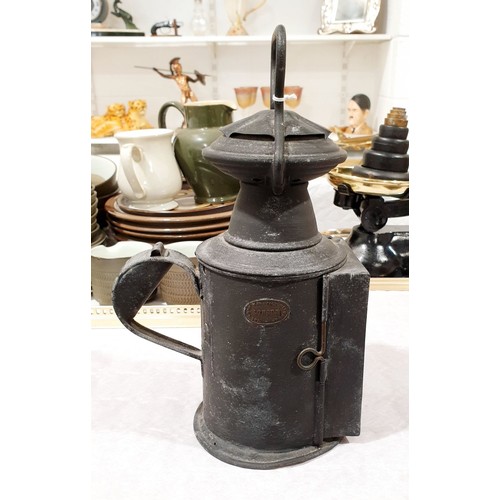 61 - An antique railway spirit burning lamp by The Lamp Manufacturing Co. Ltd., London, height 12