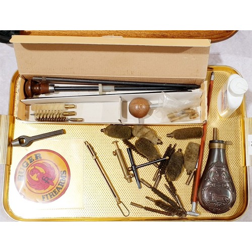 76 - An unused Pedersoli muzzle loading/cleaning kit together with a modern powder flask, powder measure,... 