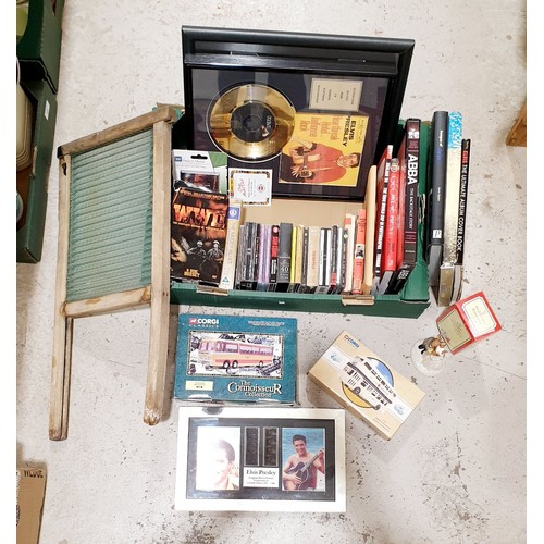 82 - A box containing boxed Corgi vehicles, music memorabilia, assorted and a vintage wash board. No ship... 