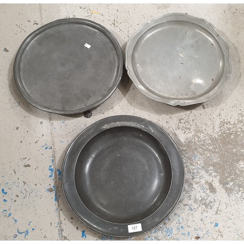 127 - Two antique pewter footed trays and a dish, the dish A/F, the largest diameter 14.5