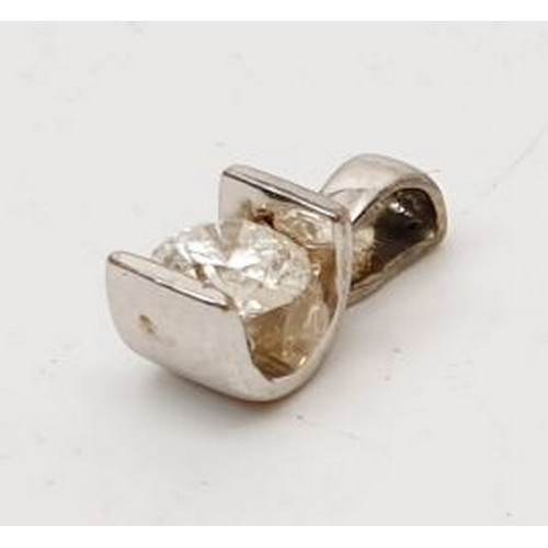 17 - A hallmarked 9ct gold pendant set with a .33ct diamond, gross weight .7g. UK shipping £14.