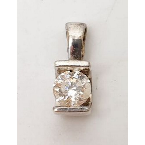 17 - A hallmarked 9ct gold pendant set with a .33ct diamond, gross weight .7g. UK shipping £14.