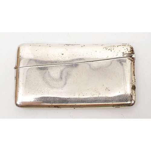 38A - A hallmarked silver card case, length 3.5