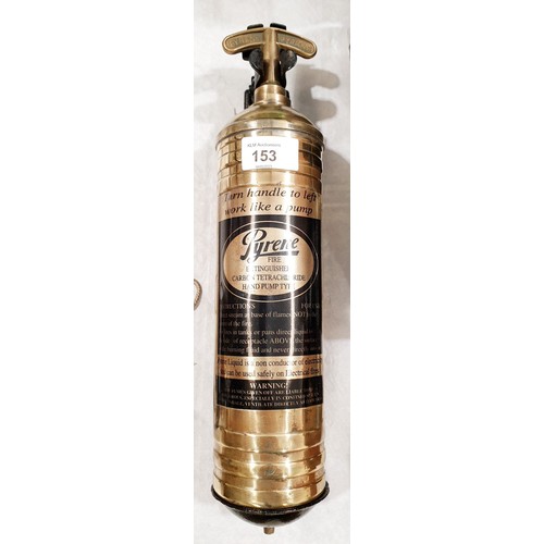 153 - A vintage Pyrene brass fire extinguisher with wall mount. UK shipping £14.