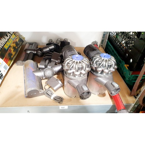 157 - Two cordless Dyson vacuum cleaners with chargers, some parts missing. No shipping. Arrange collectio... 