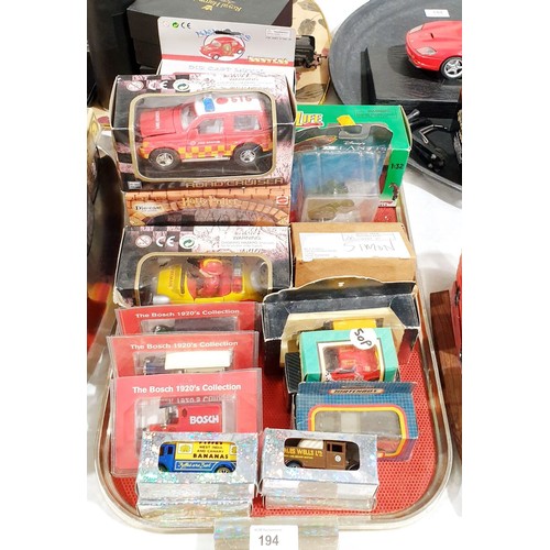 194 - A selection of boxed toy vehicles. UK shipping £14.