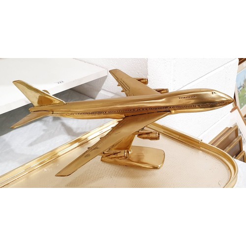 228 - A vintage brass model of a Boeing 747 aeroplane, length 15.25