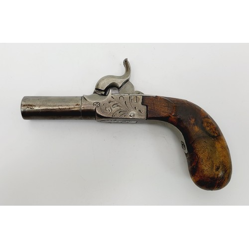 78 - A mid 19th century percussion turn-off barrel pocket pistol with burr walnut grip and concealed trig... 