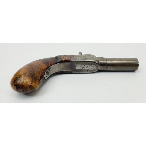 78 - A mid 19th century percussion turn-off barrel pocket pistol with burr walnut grip and concealed trig... 