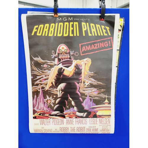 156 - Five reproduction posters including Salvador Dali and Forbidden Planet, the largest 39.5