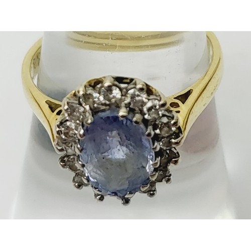 12 - A hallmarked 18ct gold Ceylon sapphire and diamond cluster ring A/F, size M/N, gross weight 4.2g. UK... 